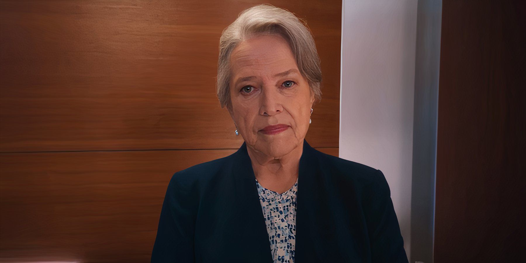 Kathy Bates as Matlock in an elevator looking serious in Matlock