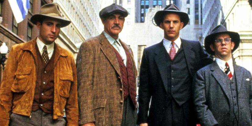Sean Connery and Kevin Costner standing on the street in The Untouchables
