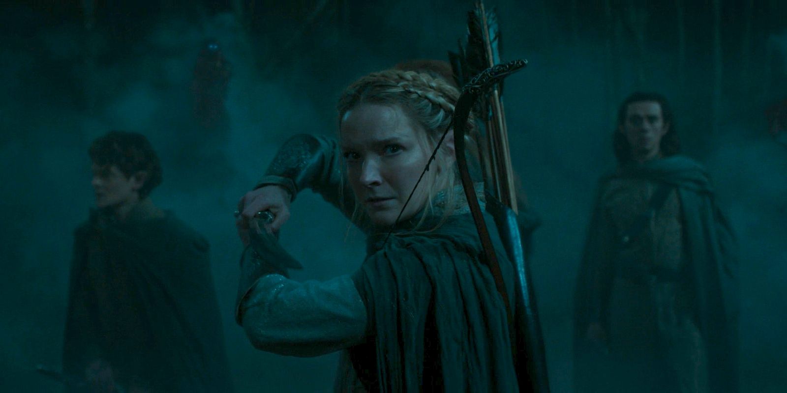 In the midst of the darkness, Galadriel (Morfydd Clark) wields her sword to fight against the Barrow-wights in The Lord of the Rings: The Rings of Power Season 2 Episode 4