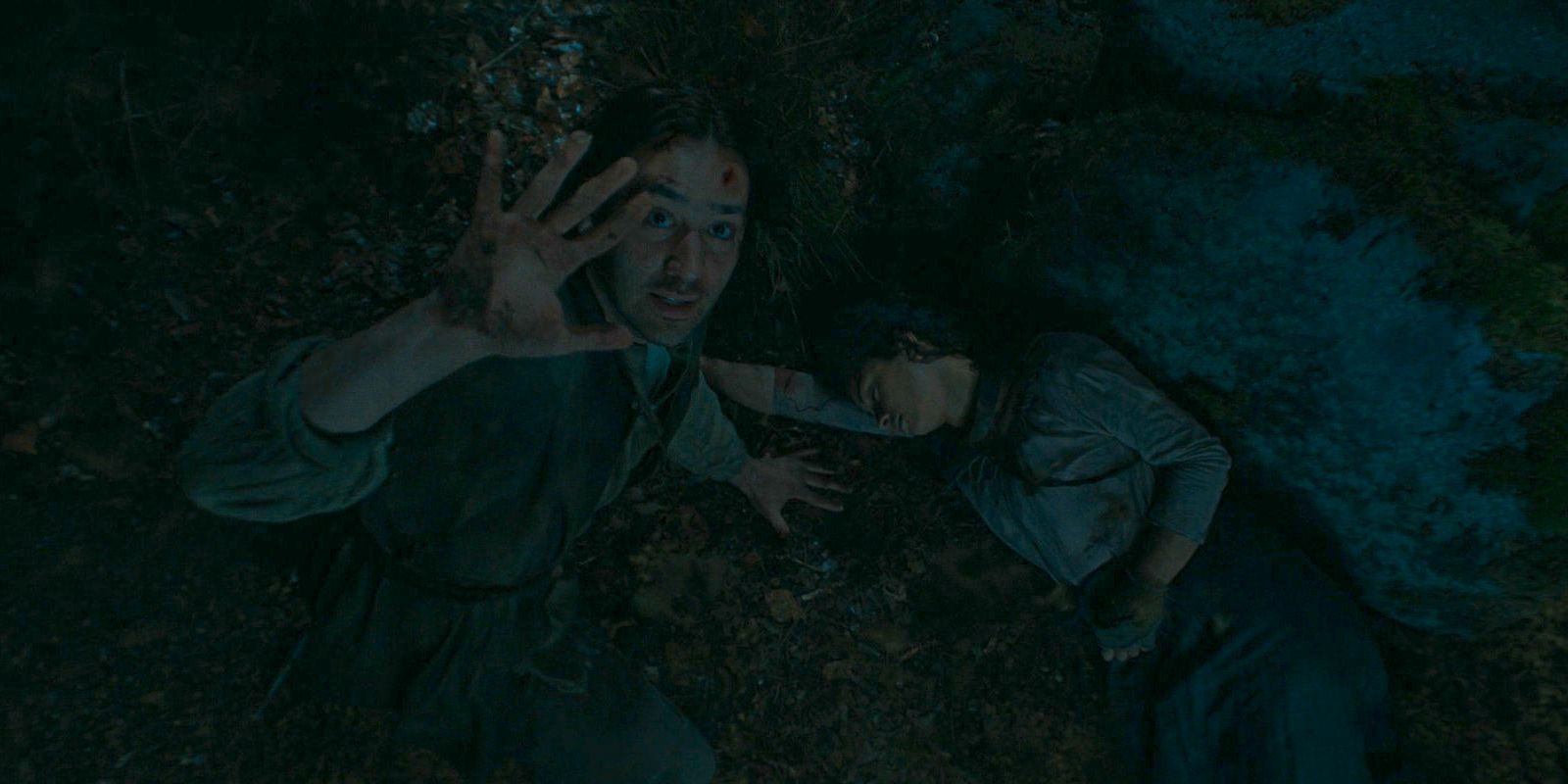 Isildur and Estrid being attacked by giant trees in The Lord of the Rings: The Rings of Power Season 2 Episode 4