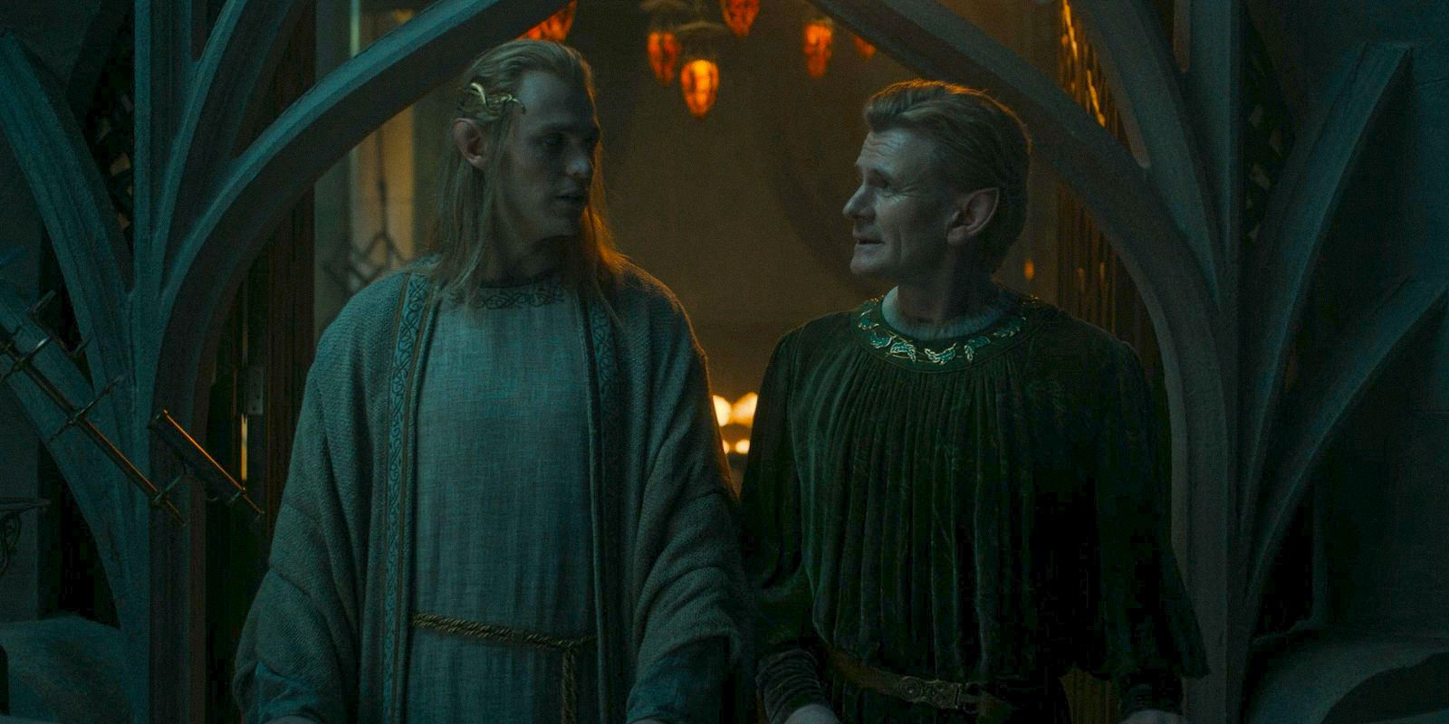 Sauron (Charlie Vickers) and Celebrimbor (Charles Edwards) standing side by side, looking at each other in The Lord of the Rings: The Rings of Power Season 2 Episode 5