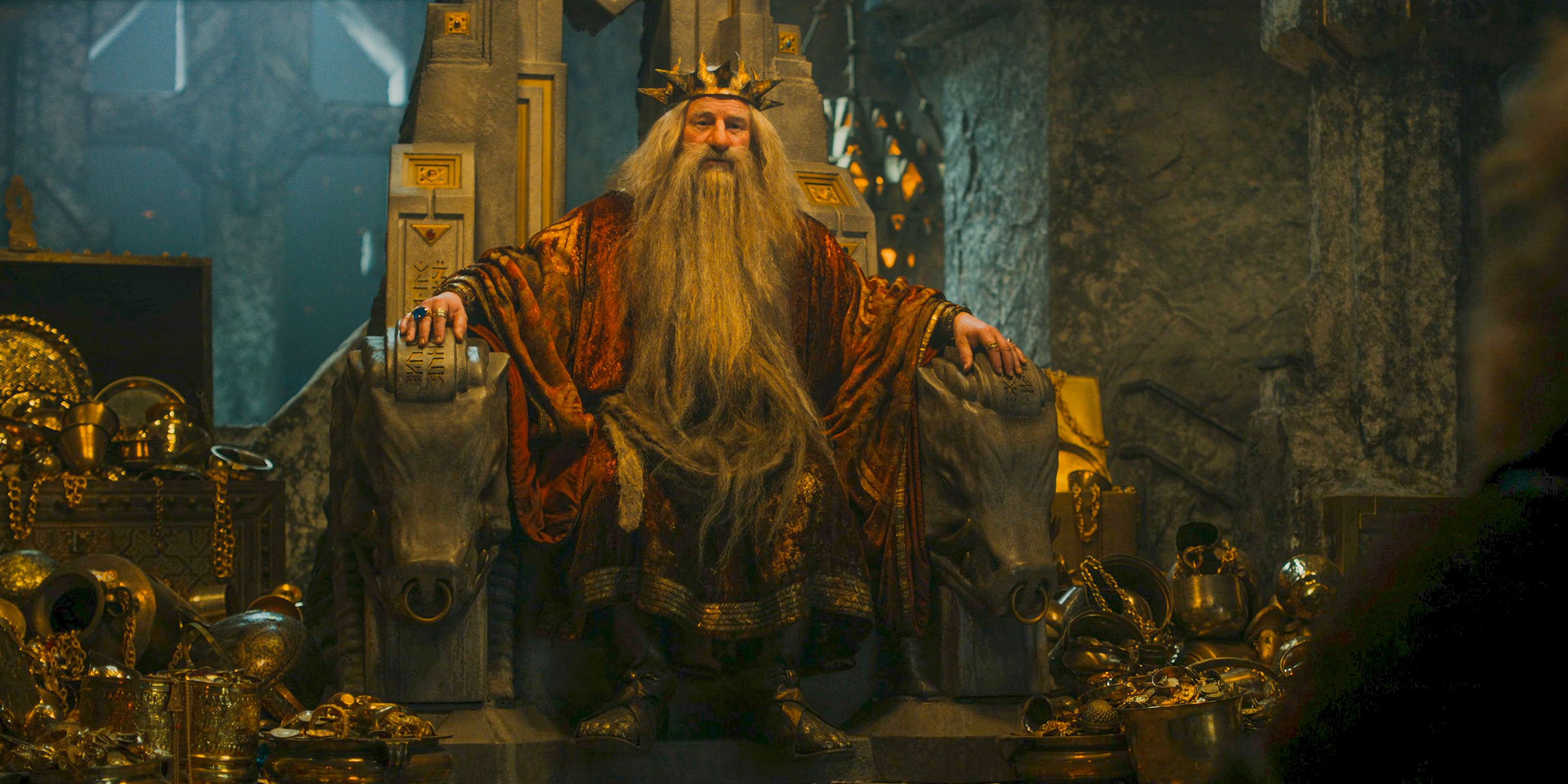 King Durin III (Peter Mullan) on his throne surrounded by gold and wealth in The Lord of the Rings: The Rings of Power Season 2 Episode 6