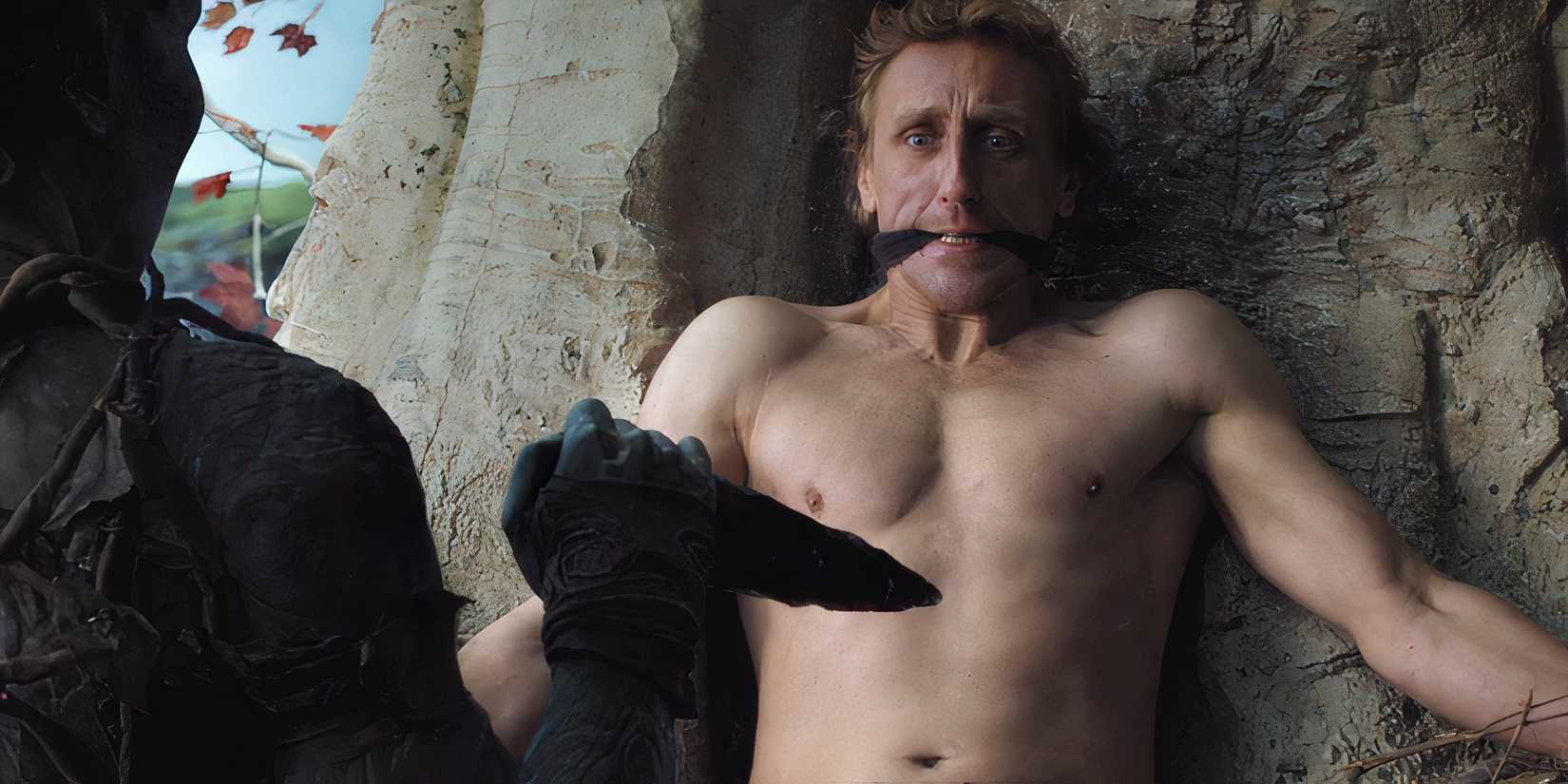 The man who becomes the Night King tied to a tree, facing one of the Children of the Forest holding a dragonglass dagger