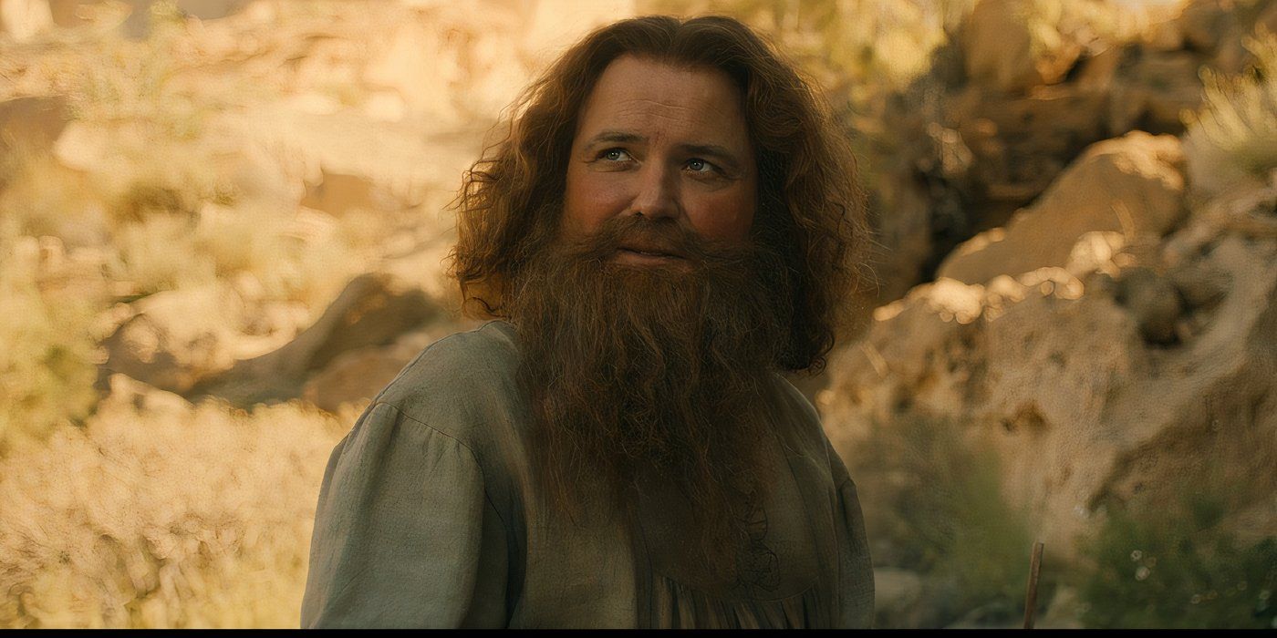 Tom Bombadil smiling at the Stranger in Rings of Power (2024)