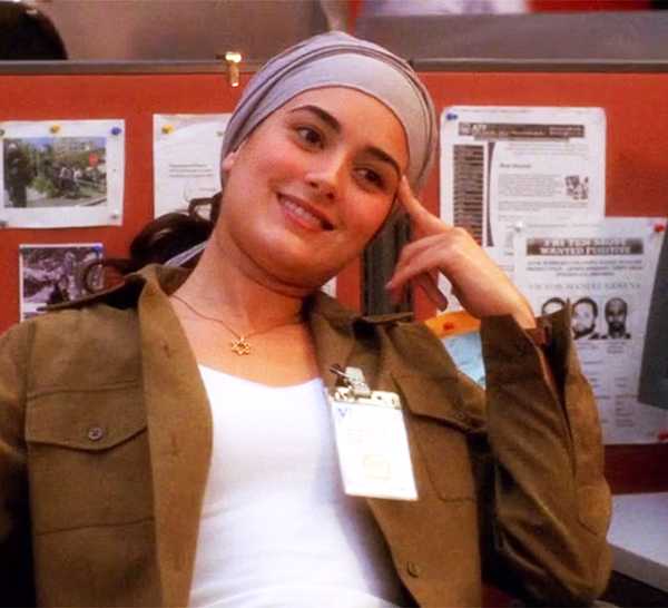 Ziva David sitting in the bullpen in NCIS