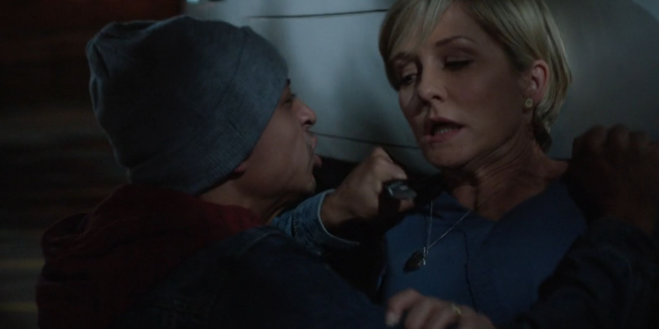 Blue Bloods a mugger holds a knife against Linda's throat