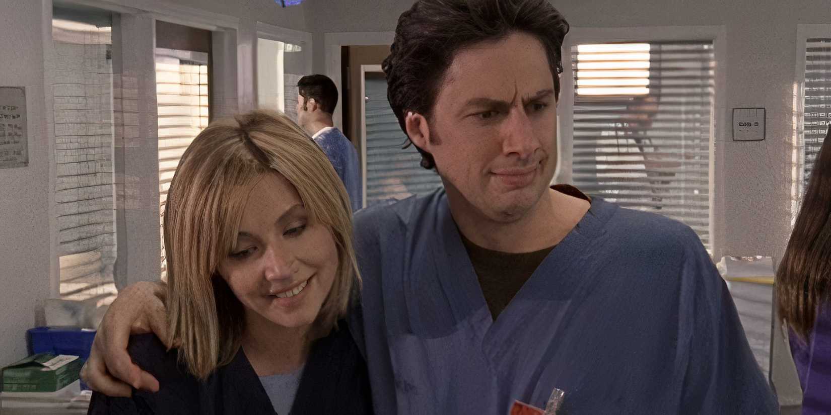 Zach Braff's JD and Sarah Chalke's Elliot Reid walking along together in Scrubs