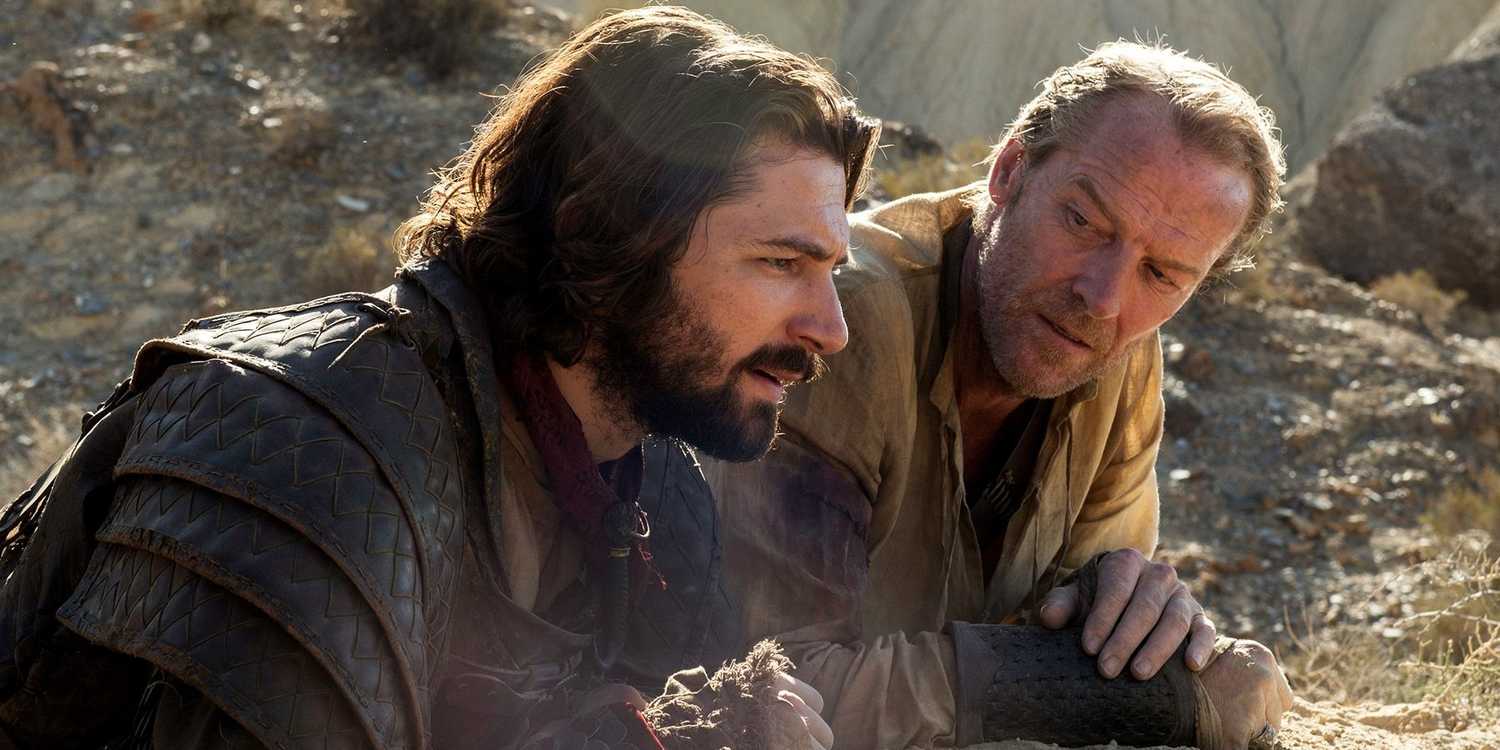 Daario Naharis and Jorah Mormont lying on the ground in Game of Thrones