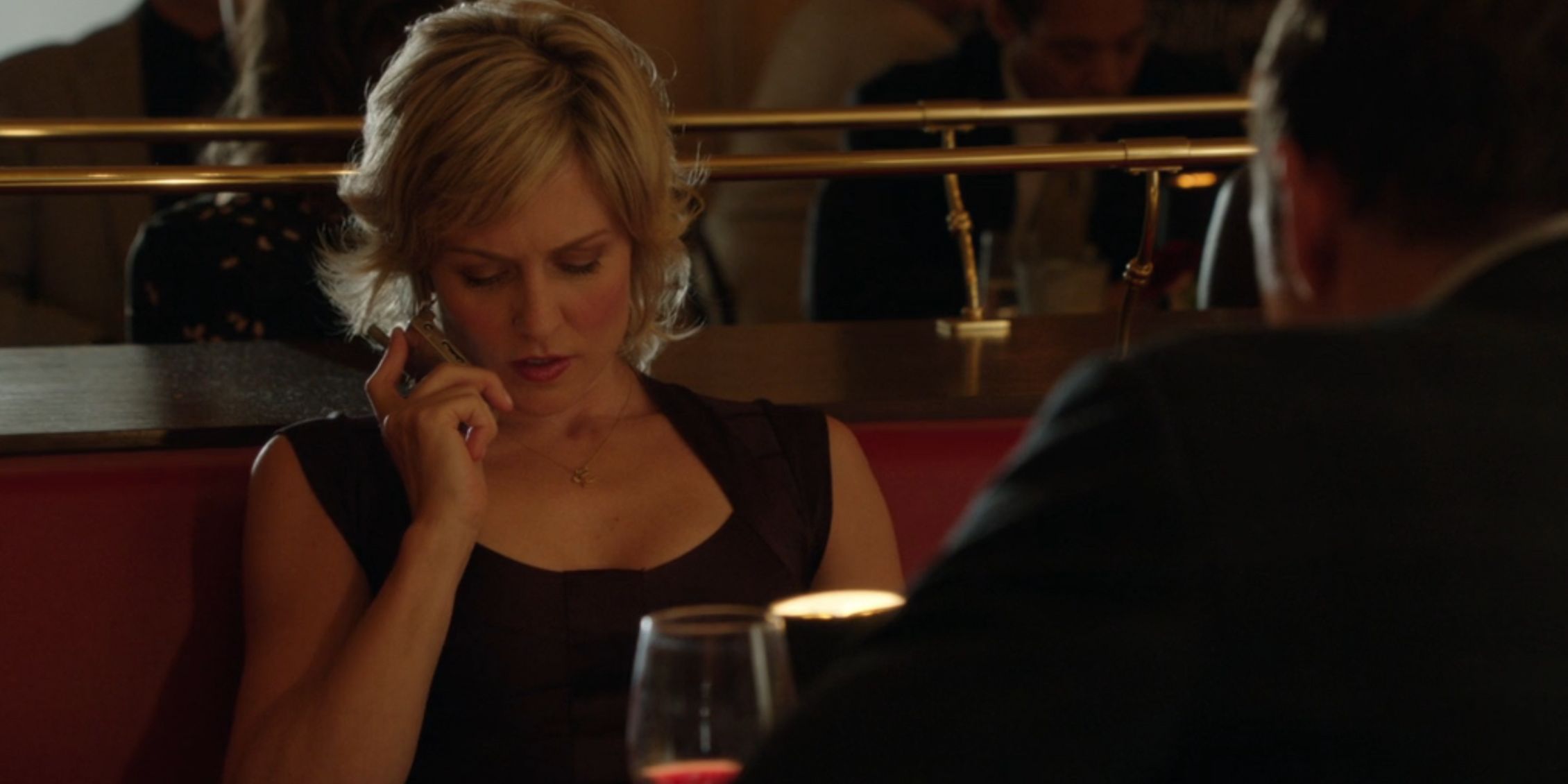 Blue Bloods Linda on the phone while at dinner with Danny