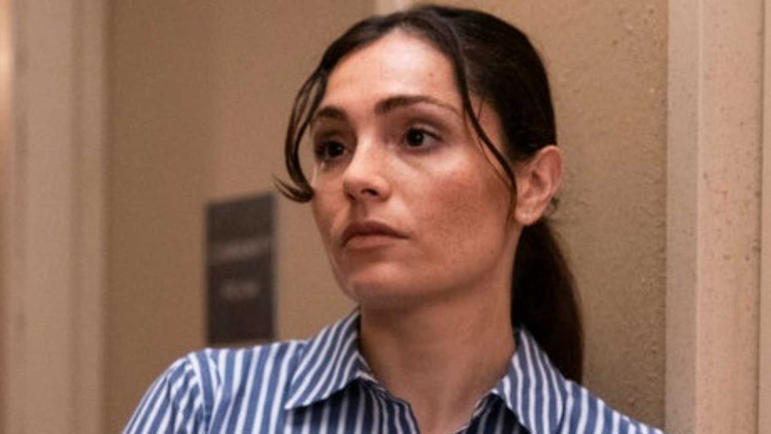 Law & Order: SVU Headshot of Kate Silva in a blouse with blue vertical stripes