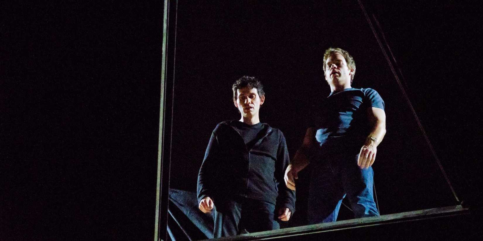Brian and Dexter looking down into the dark
