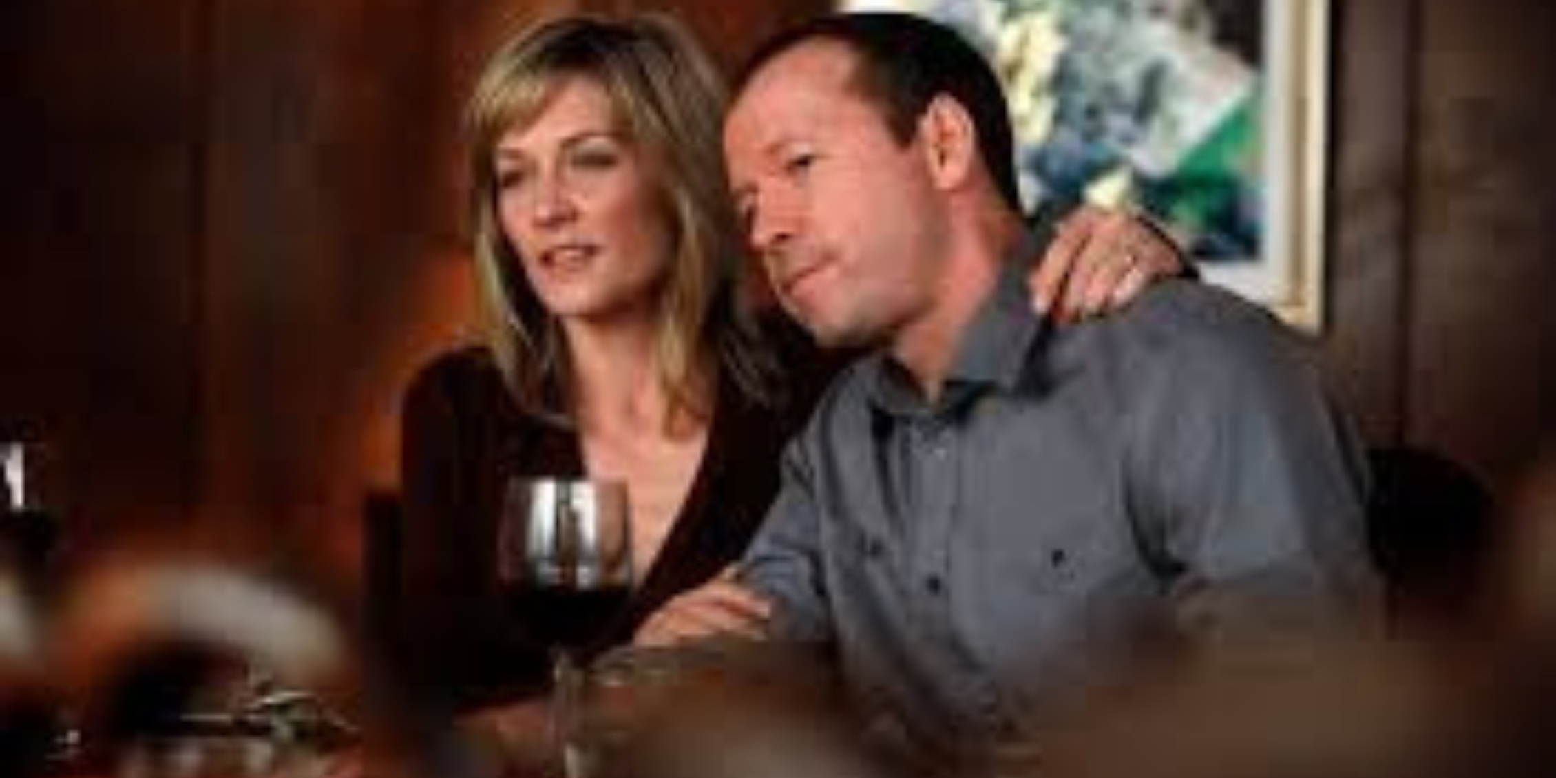 Blue Bloods Linda has her arm around Danny at family dinner