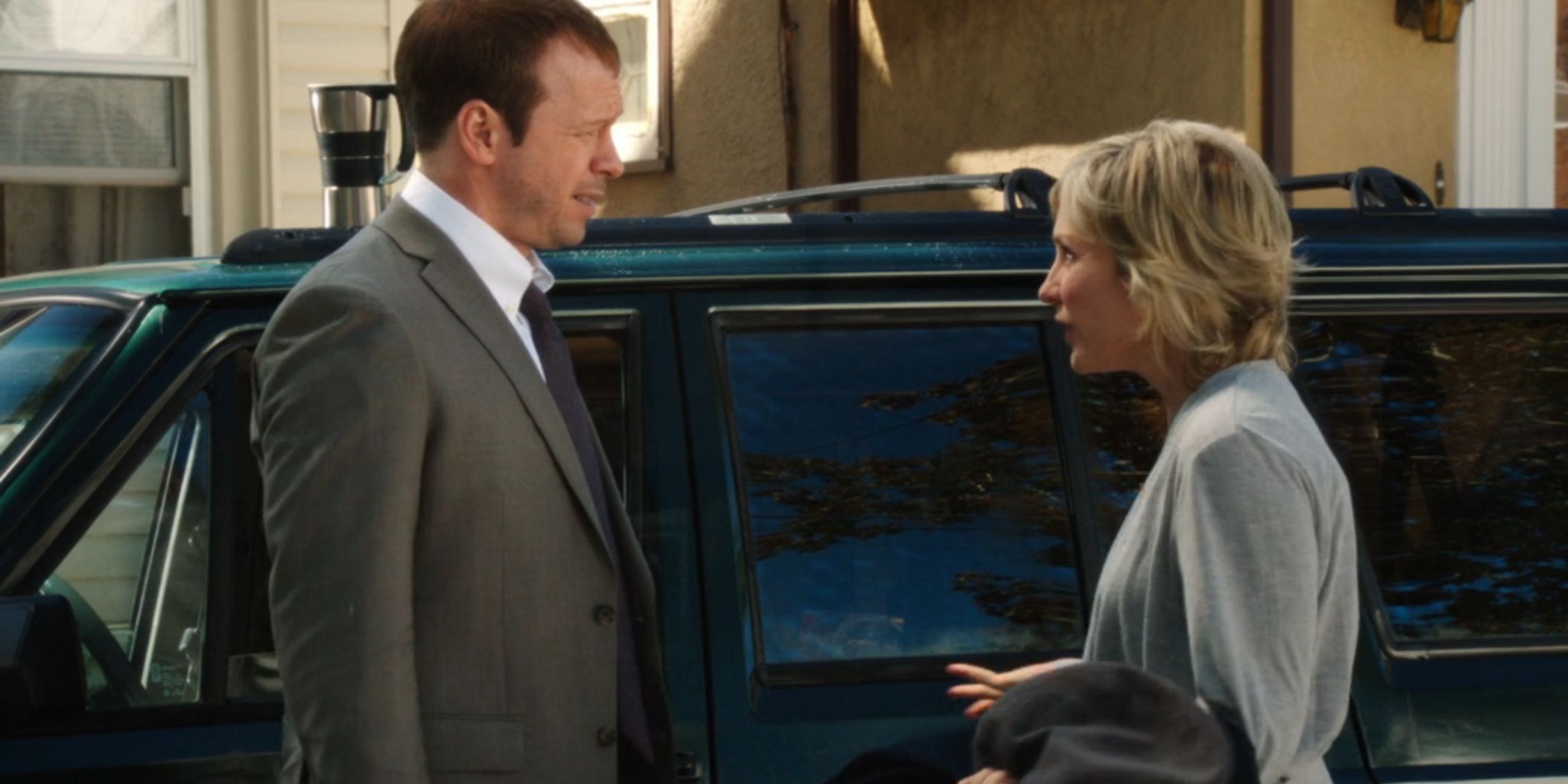 Blue Bloods Danny and Linda standing by their car talking