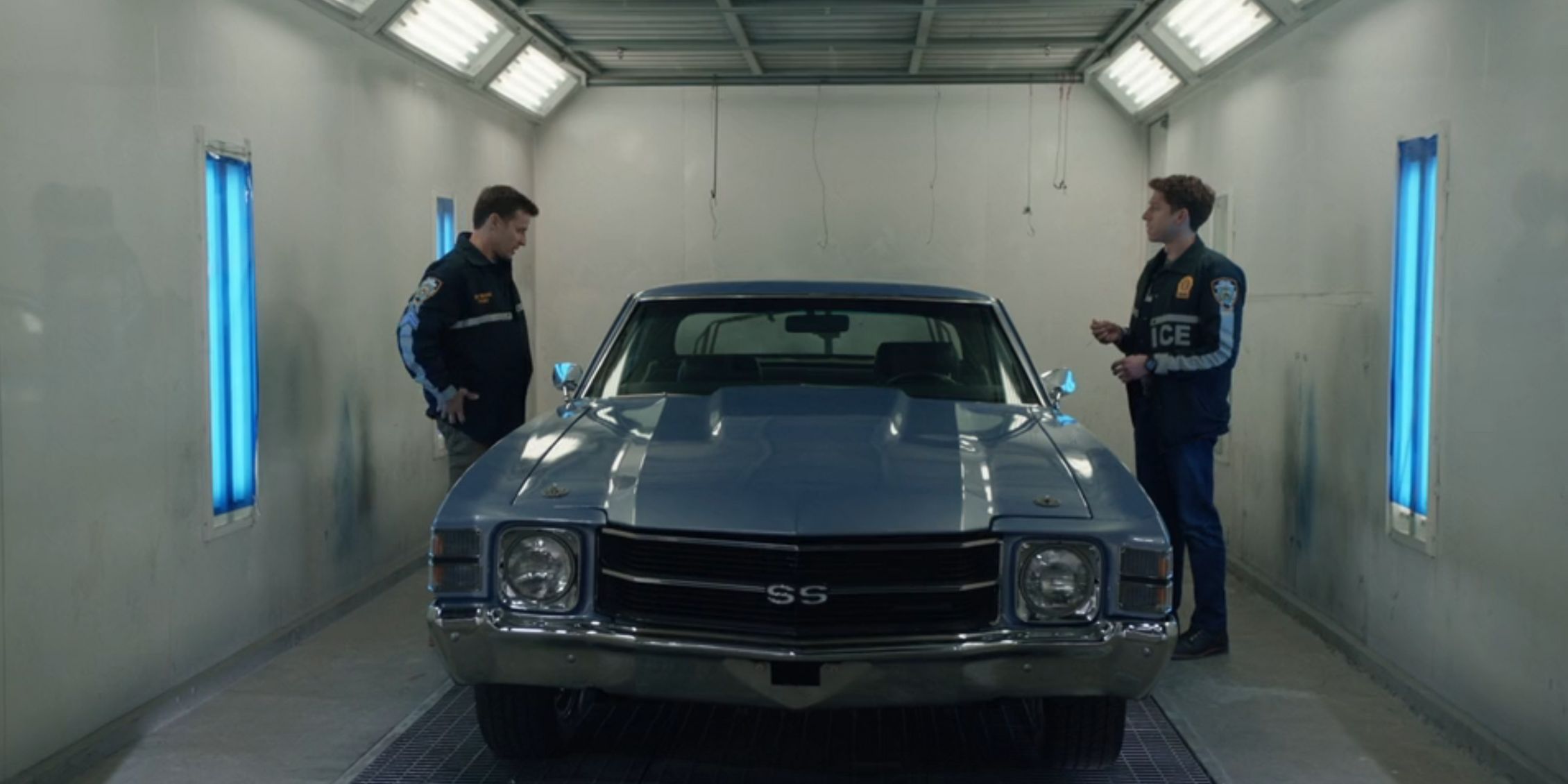 Blue Bloods long shot of Jamie and Joe inspecting the car