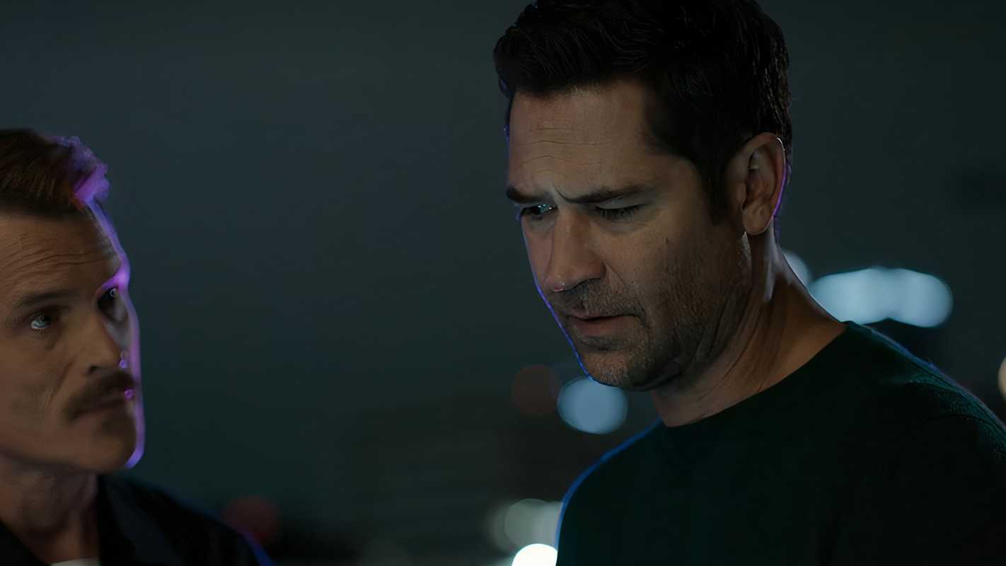 A police officer looks at Mickey in The Lincoln Lawyer season 3