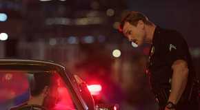 A police officer pulls Mickey over in The Lincoln Lawyer season 3