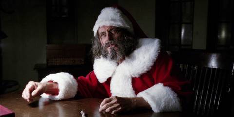 Leigh Emerson in a santa outfit at a bar in American Horror Story Asylum 