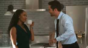 Andy and Mickey smile at each other in the kitchen in The Lincoln Lawyer season 3 episode 3