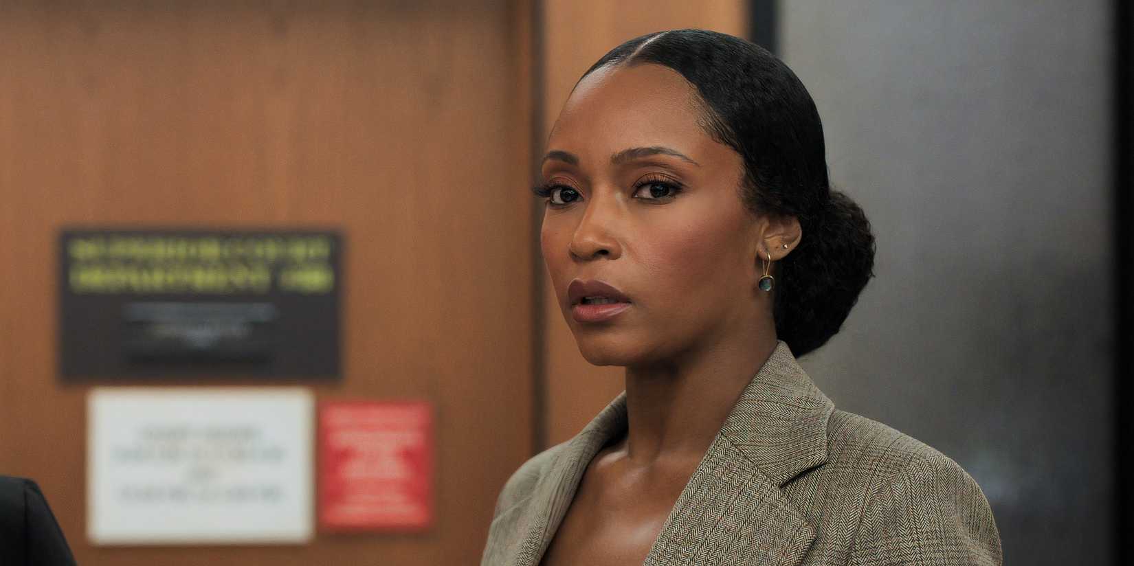 Andy stands in a law office in The Lincoln Lawyer season 3