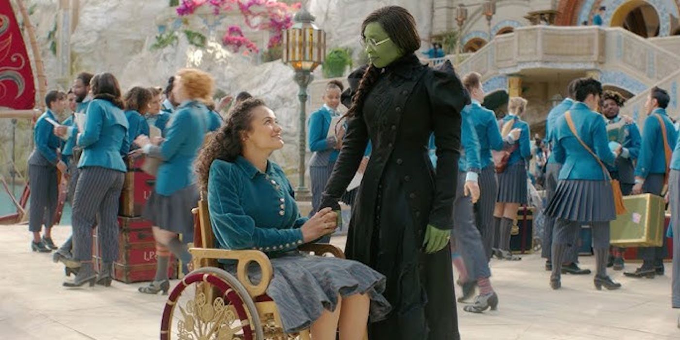 Cynthia Erivo as Elphaba and Marissa Bode as Nessa, holding hands in Wicked