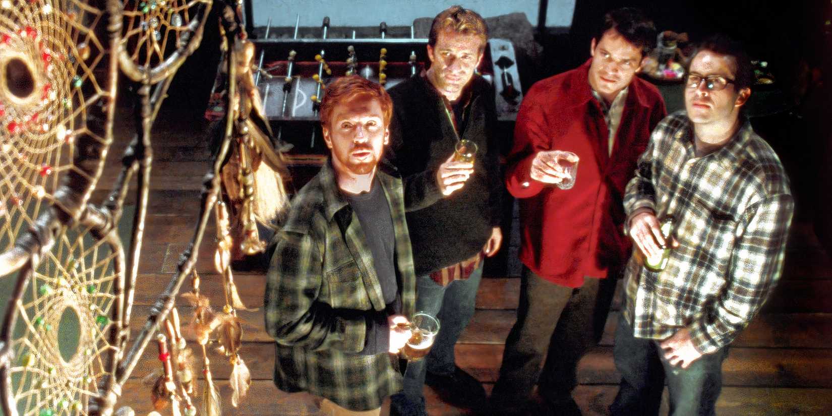 Damian Lewis' Jonesy, Thomas Jane's Henry, Timothy Olyphant's Pete and Jason Lee's Beaver all toasting to a dreamcatcher in Dreamcatcher