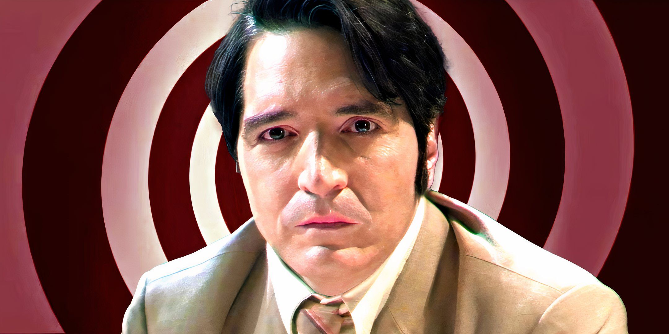 David Dastmalchian as Jack looking distraught against backdrop of hypnosis spiral in Late Night with the Devil