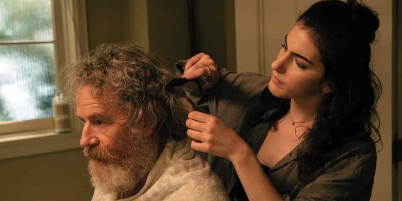 Fia Baxter (Lilli Kay) cutting Michael Desiato's (Bryan Cranston) hair in Your Honor.