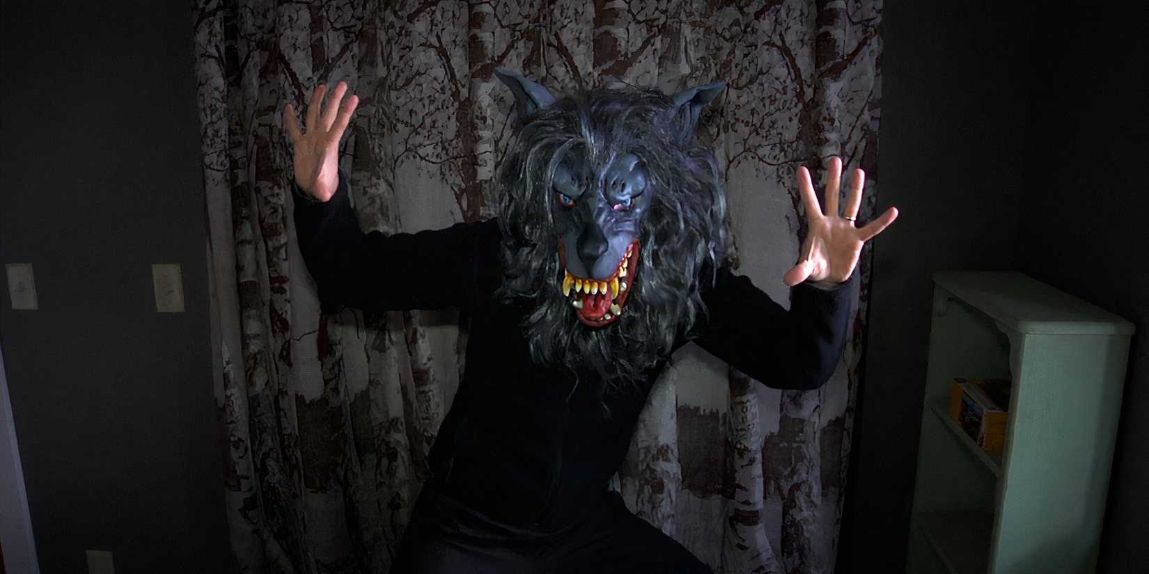 Mark Duplass as a serial killer wearing a grey wolf mask in Creep 2014