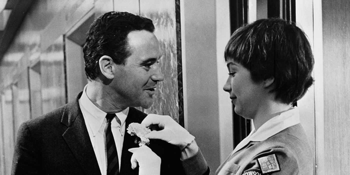 fran putting a flower in bud's suit in the apartment (1960)