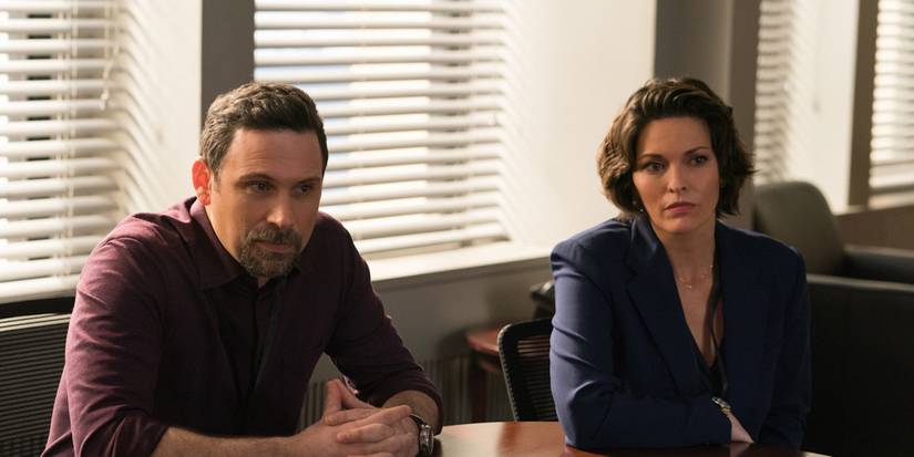 Isobel and Jubal sitting at a table together in FBI