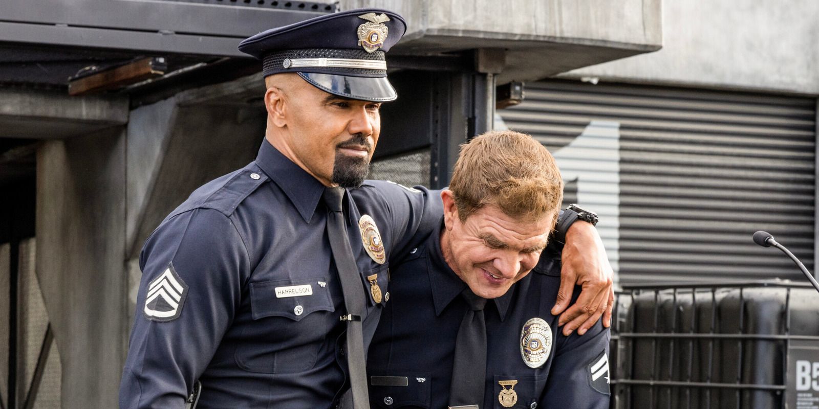 Shemar Moore as Hondo with his arm around the shoulder of Kenny Johnson as Dominque Luca in S.W.A.T.