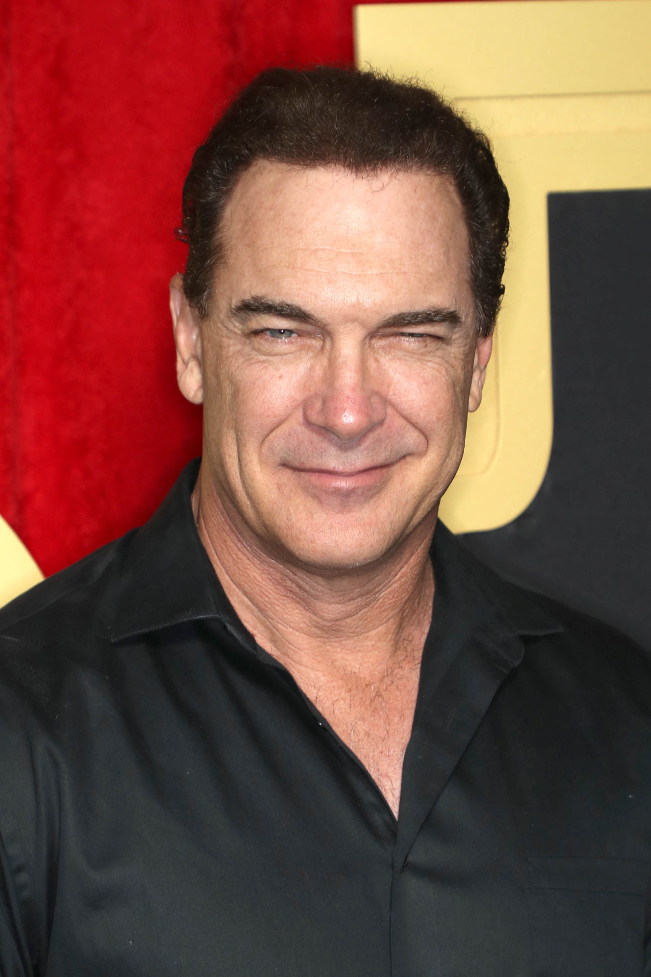 Headshot Of Patrick Warburton