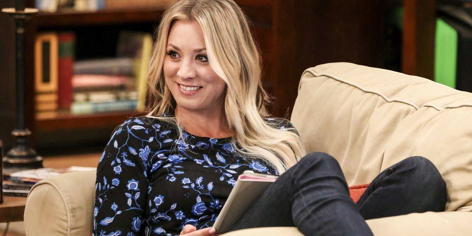 Kaley Cuoco as Penny sitting on the couch reading in The Big Bang Theory