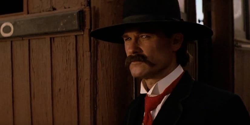 Kurt Russell as Wyatt Earp stepping off the train in Tombstone