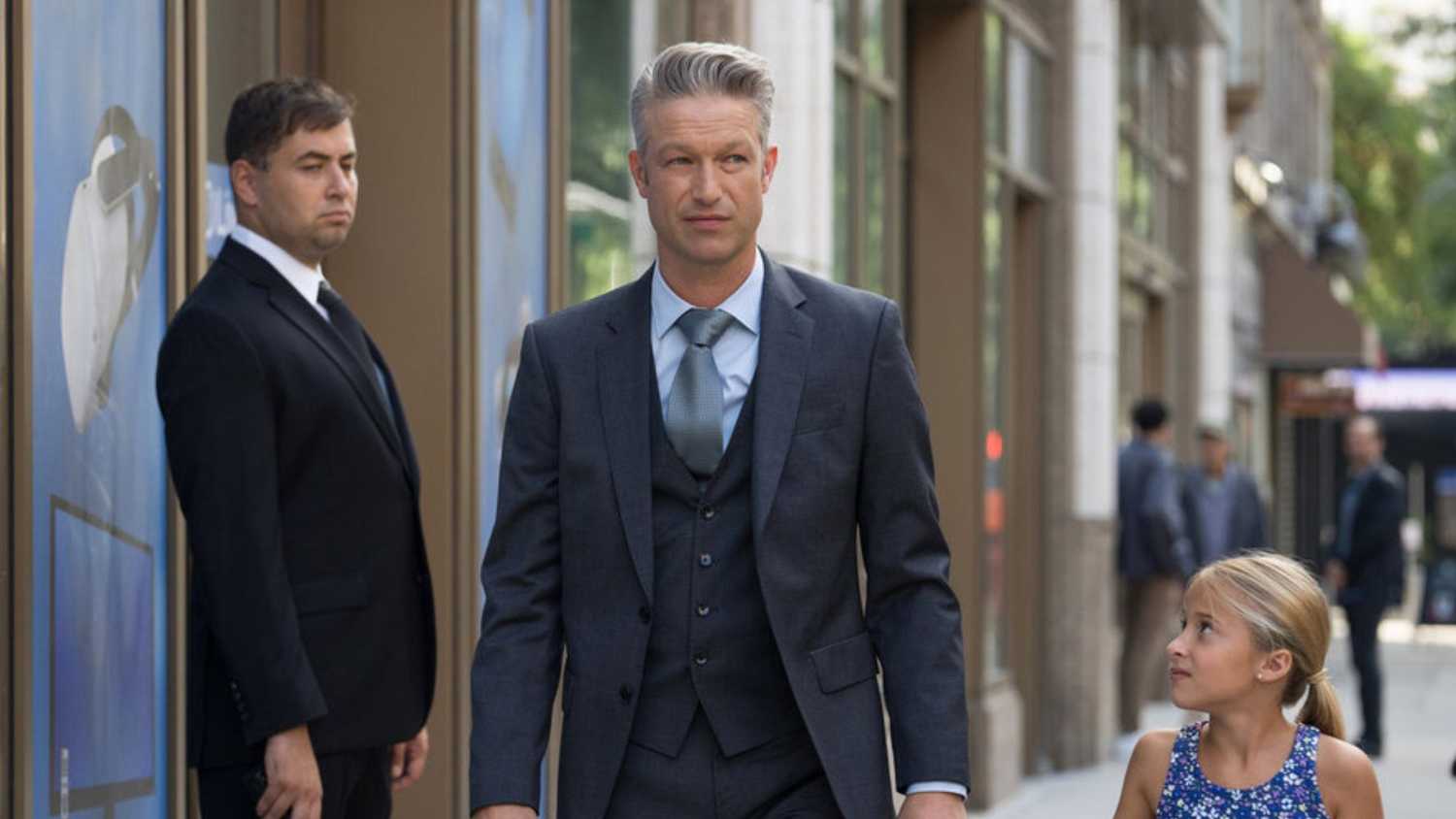 Law & Order- SVU Carisi walks with his daughter Jessie down the street, holding her hand