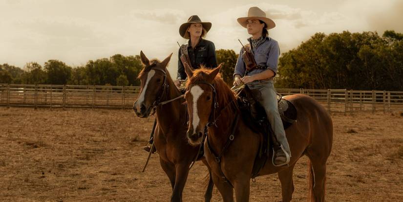 Two women ride horses in Territory
