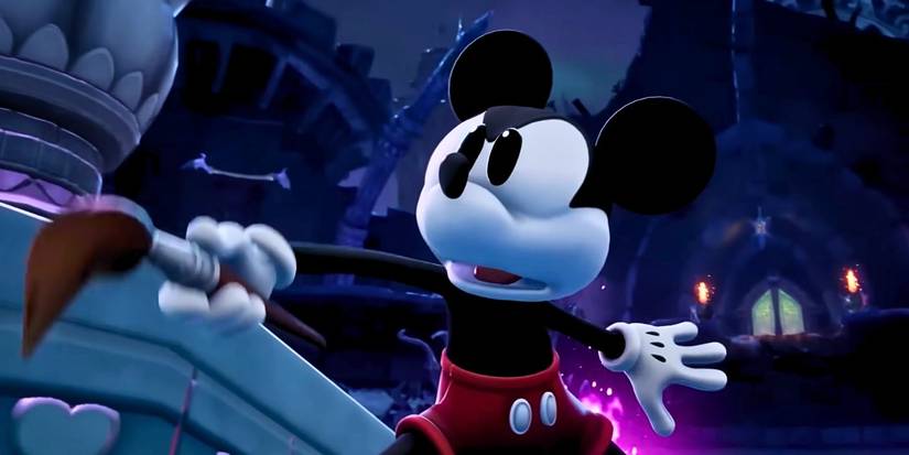 Mickey holding up his paintbrush in Epic Mickey Rebrushed