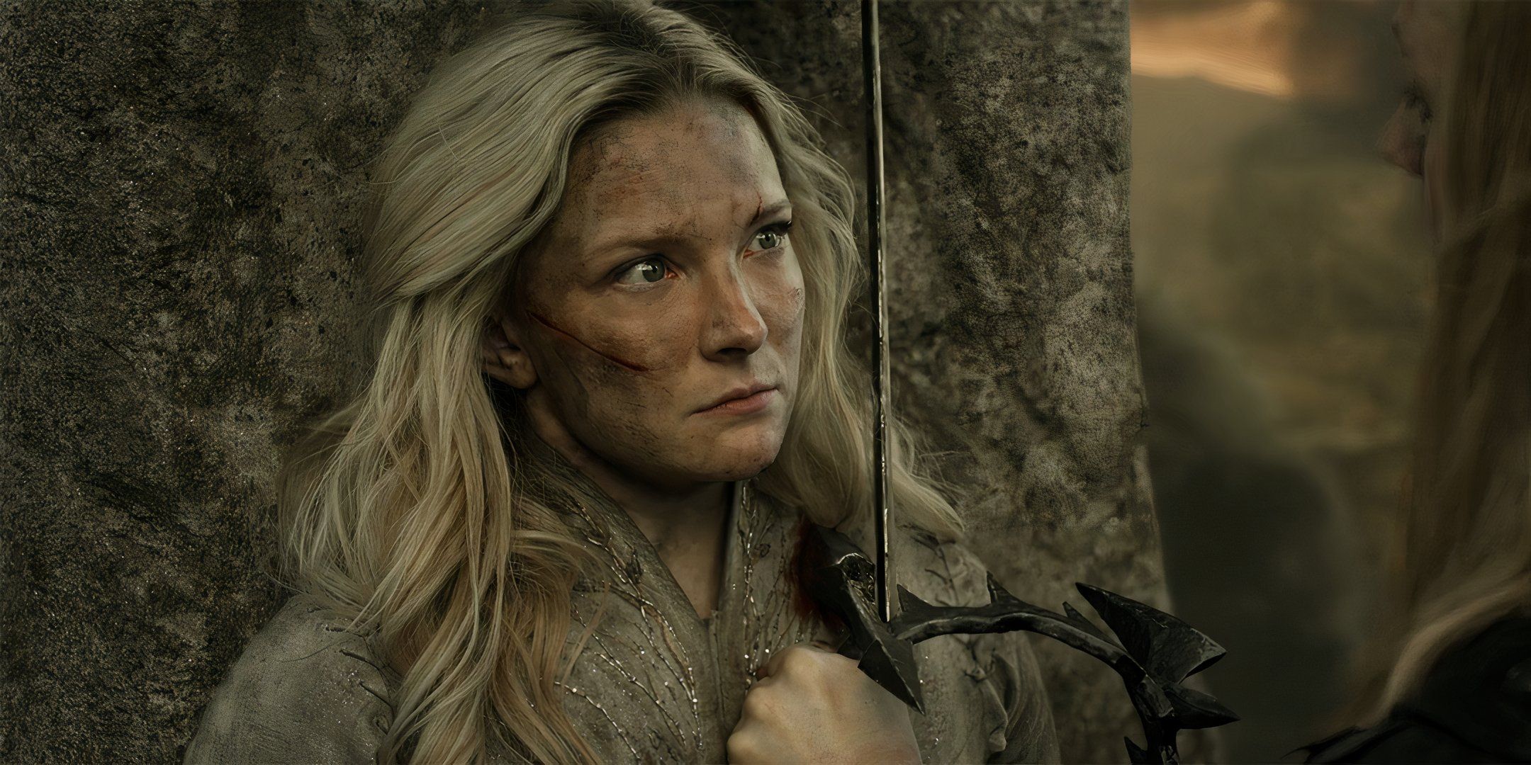 Morfydd Clark as Galadriel looking scared as she's stabbed by Sauron with his crown in The Rings of Power season 2 finale