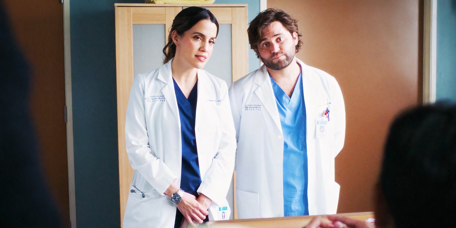 Natalie Morales as Monica Beltran and Jake Borelli as Levi Schmitt in Grey's Anatomy season 21 episode 2