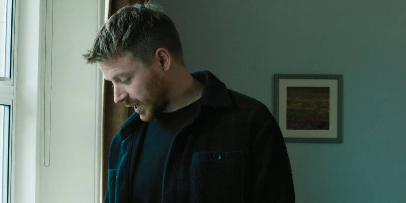 River (Jack Lowden) looks away while talking to David in the Slow Horses season 4 finale