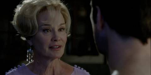 Constance Langdon talks to Ben late in the middle of the night by the stove in American Horror Story Murder House.