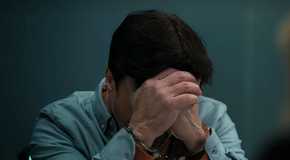 Sam Scales has his face in his hands in The Lincoln Lawyer season 3