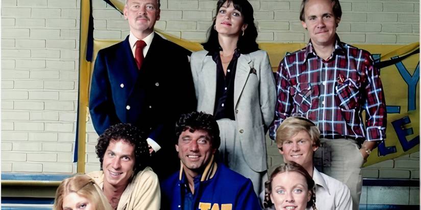 The cast of The Waverly Wonders posing together in a school gym