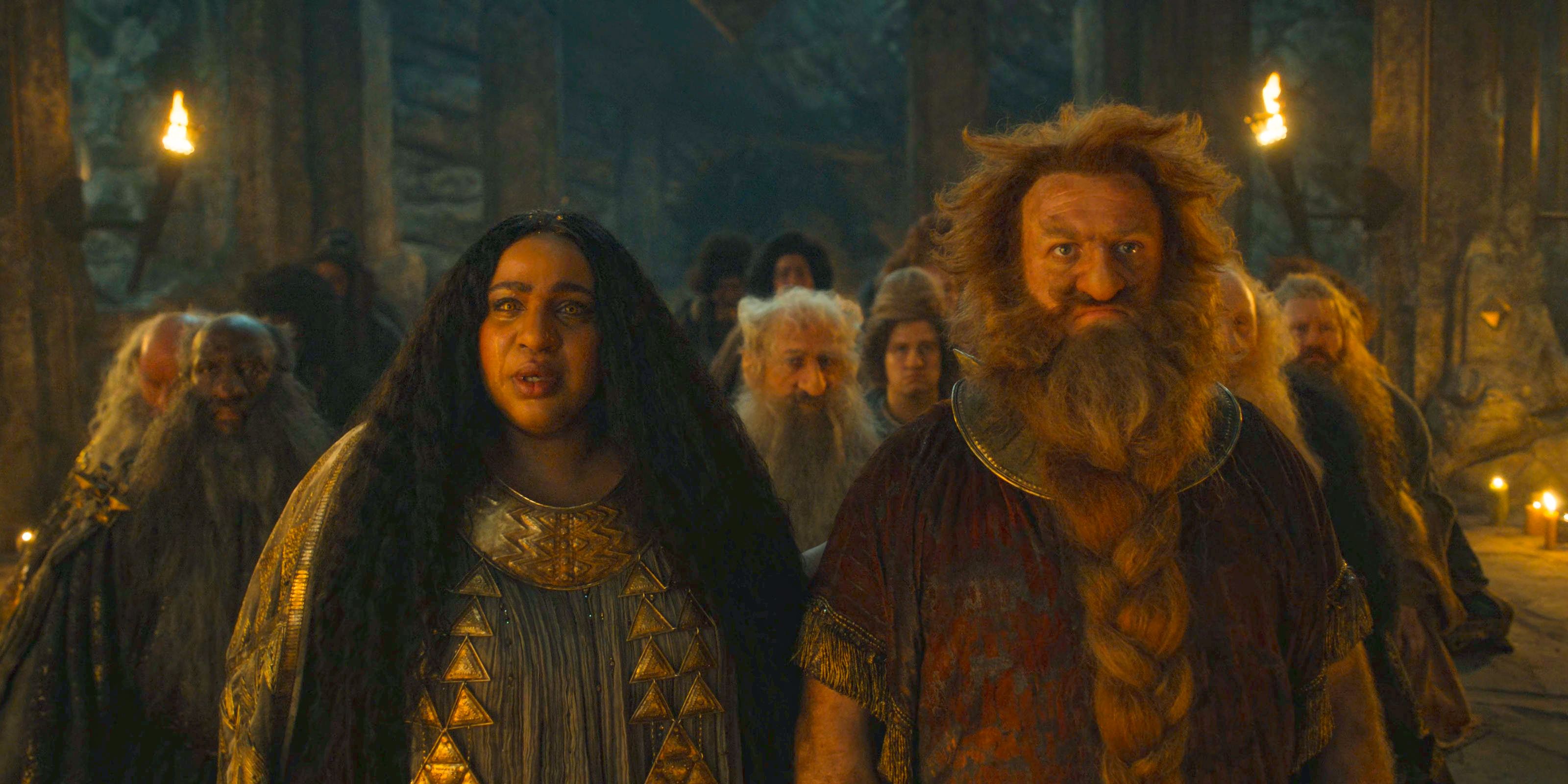 Prince Durin IV (Owain Arthur), Disa (Sophia Nomvete) mourning the death of King Durin in The Lord of the Rings: The Rings of Power Season 2 Episode 8