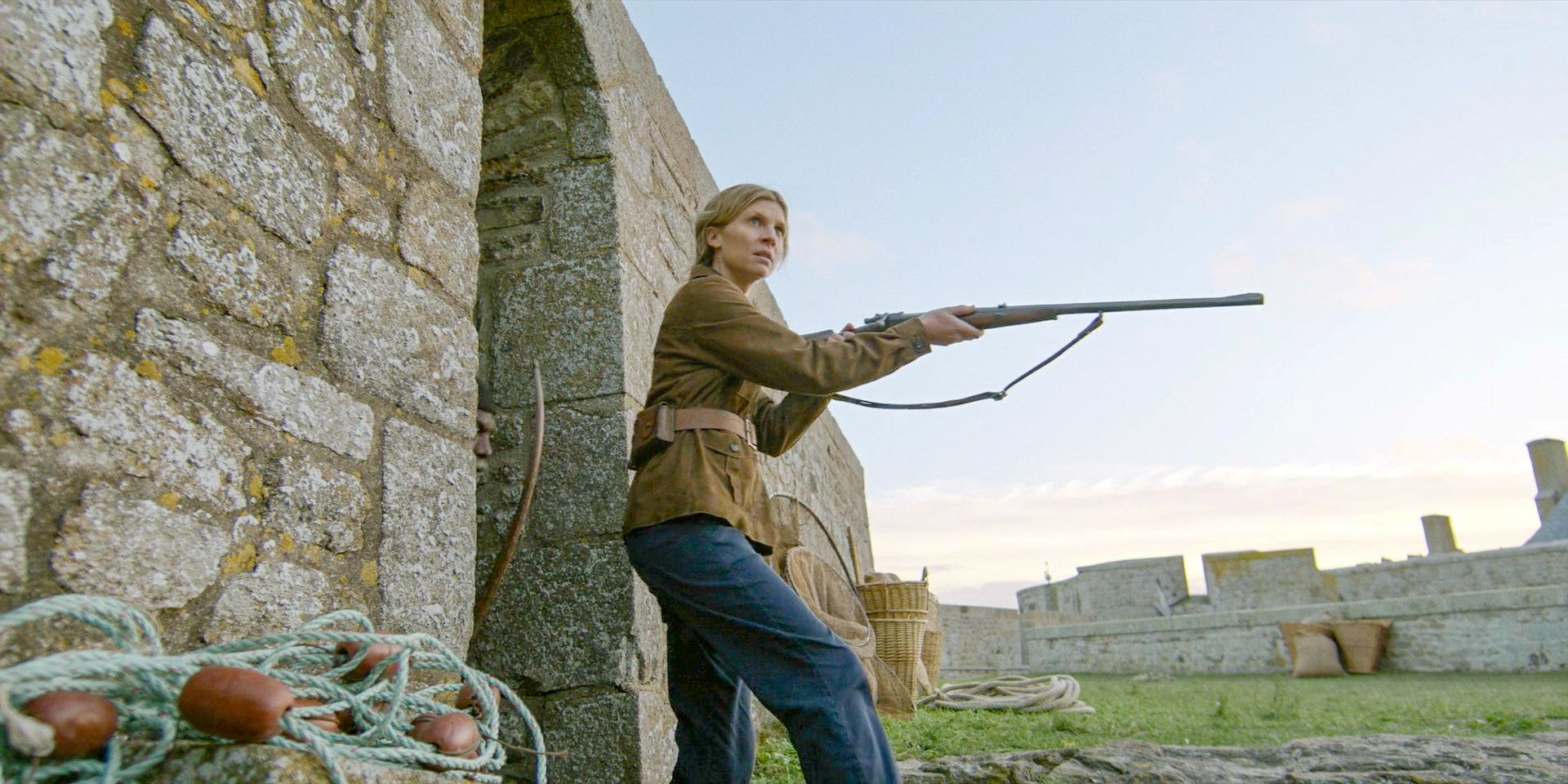 Isabelle (Clémence Poésy) aiming a rifle in The Walking Dead: Daryl Dixon Season 2 Episode 3