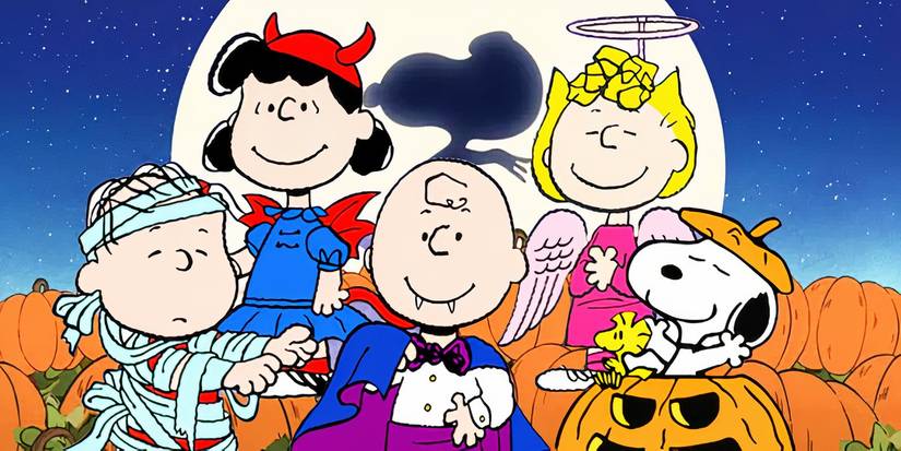 Lucy, Linus, Charlie Brown, Sally, & Snoopy in costumes (foreground) in front of a still from "It's the Great Pumpkin"