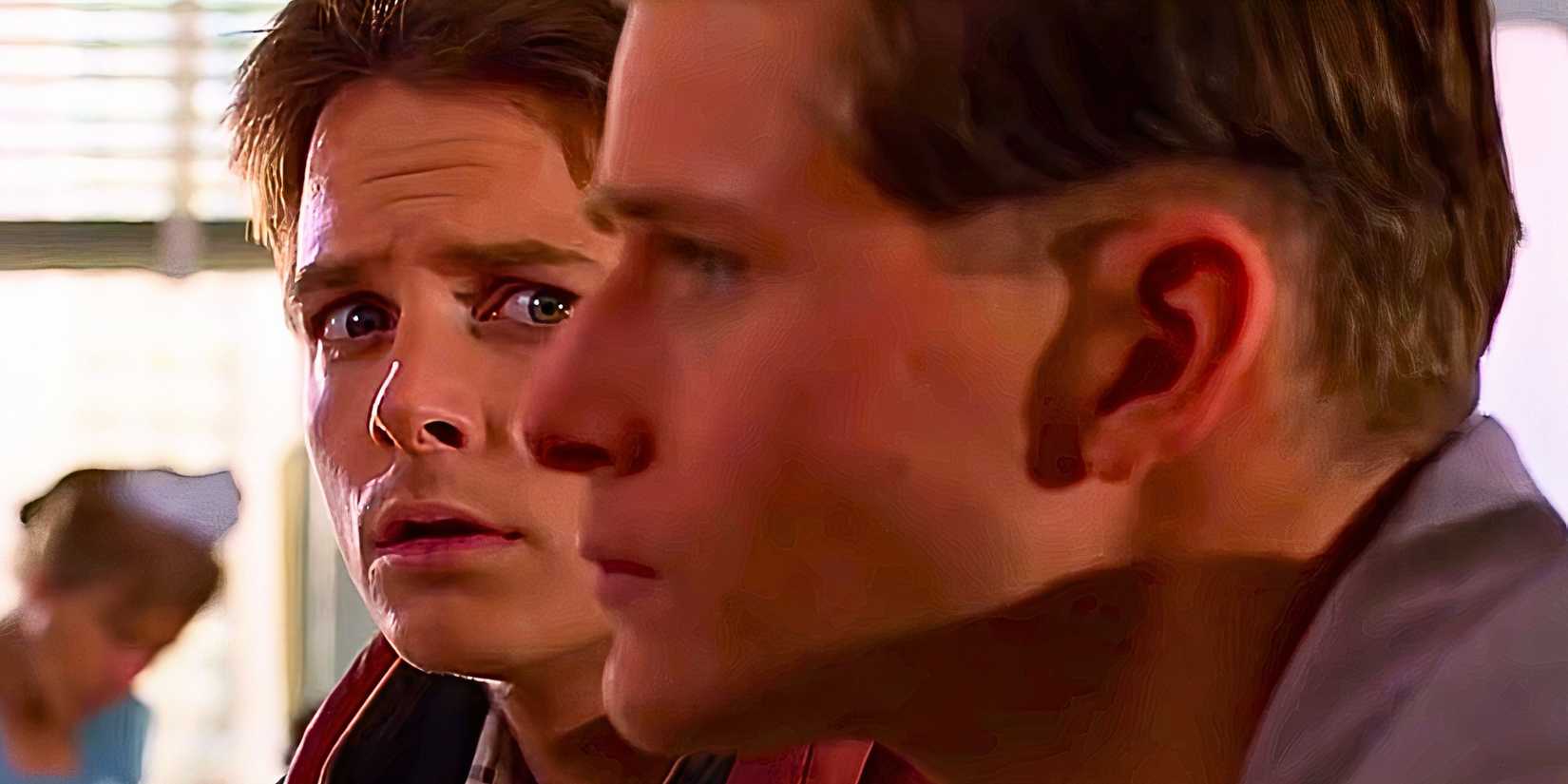 Michael J Fox as Marty McFly in Back to the Future looking at Crispin Glover as George McFly