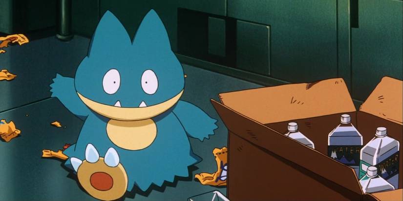 Munchlax surrounded by candy wrappers and a box of bottled water
