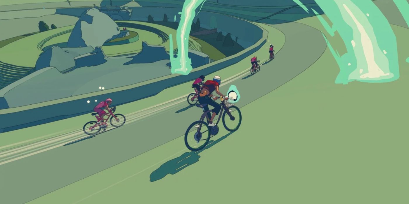 A group of cyclists zooming around the track in Wheel World