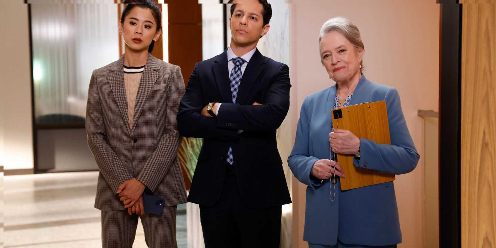 Madeline holds a folder and stands next to Billy and Sarah in Matlock.
